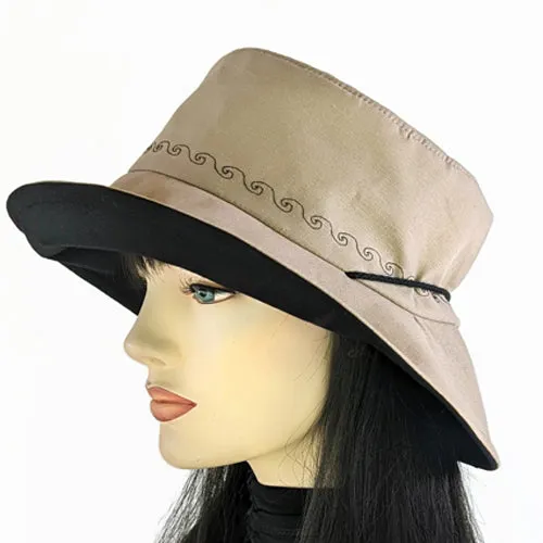 100-a Extra large bucket brim Sunblocker in neutral color with black trim, adjustable fit