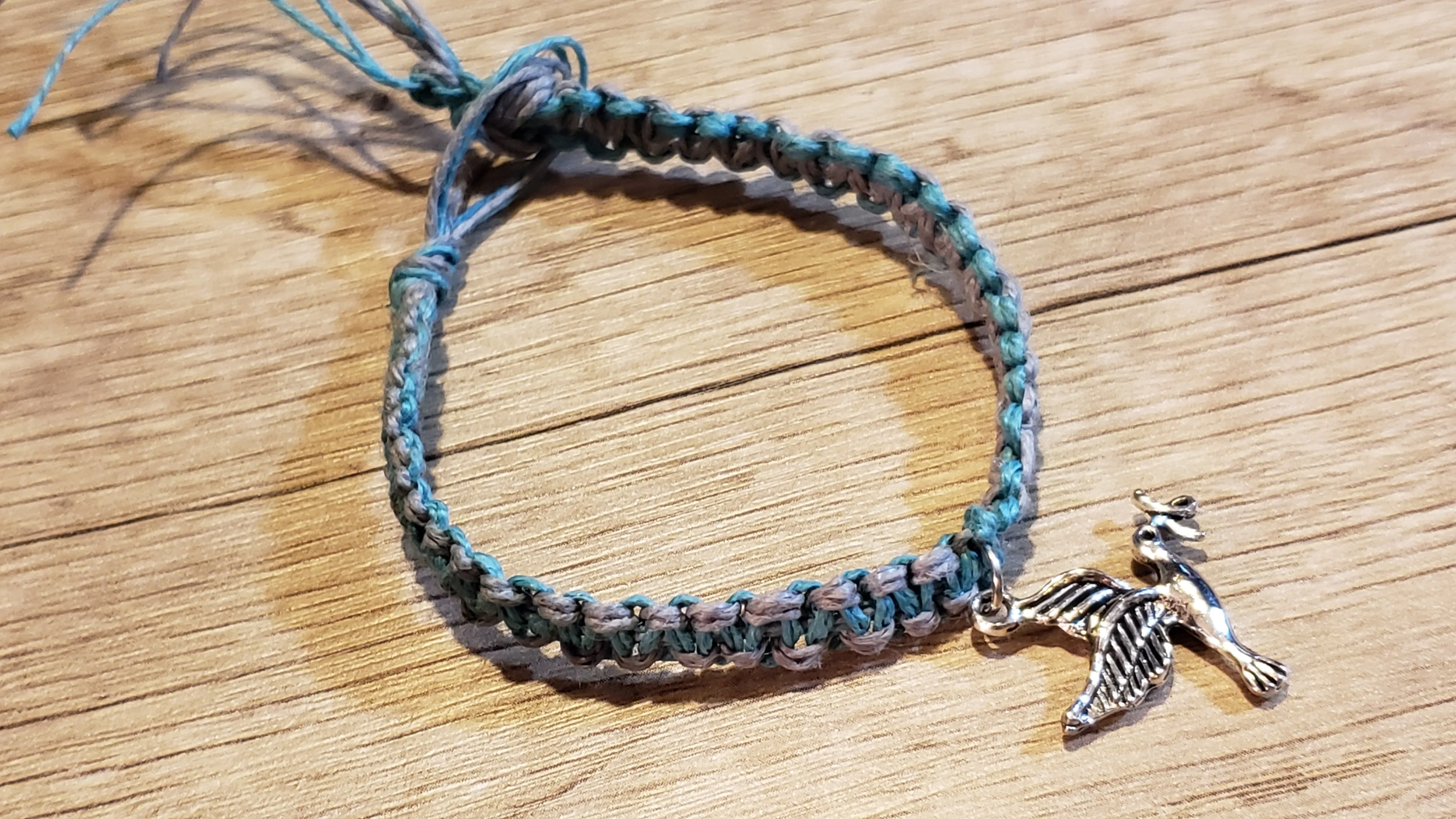 Natural Blue & Gray Dyed Hemp 6.75" Bracelet with Metal Dove Focal